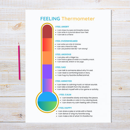 Feeling thermometer chart on a wooden surface with a pencil